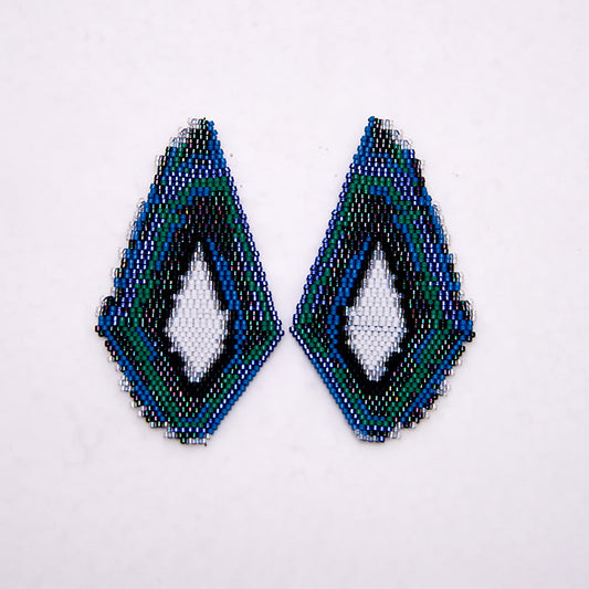 Aretes Nuquiblanco
