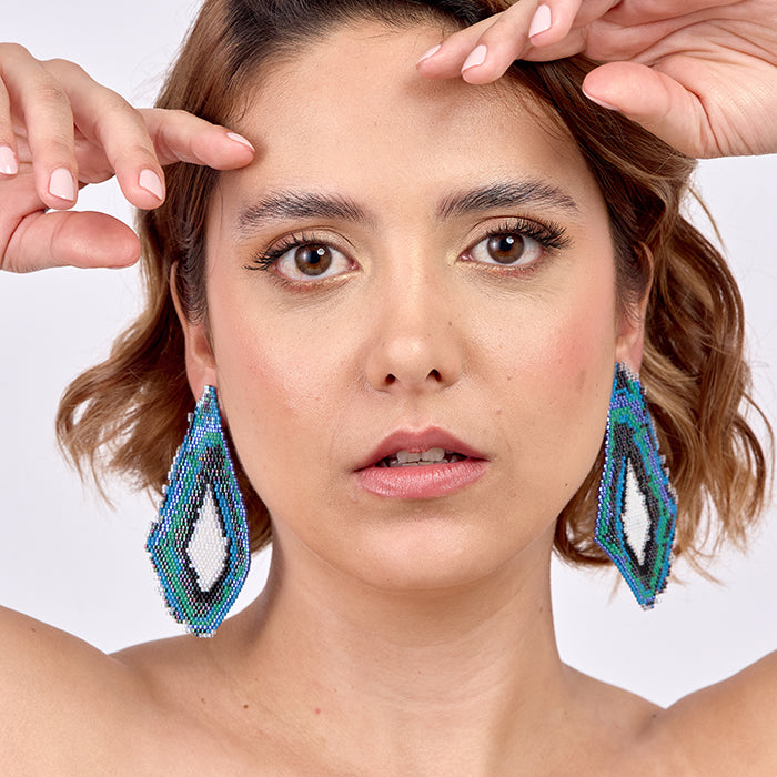 Aretes Nuquiblanco